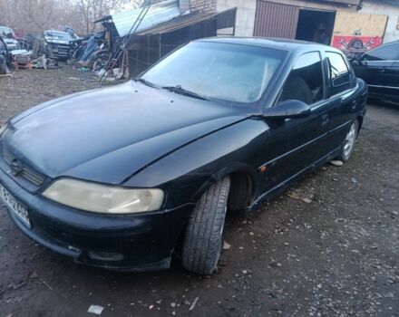 Черный Опель Вектра, объемом двигателя 1.6 л и пробегом 326 тыс. км за 900 $, фото 1 на Automoto.ua