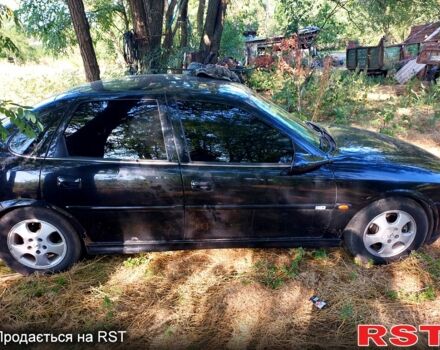 Черный Опель Вектра, объемом двигателя 1.6 л и пробегом 300 тыс. км за 1500 $, фото 1 на Automoto.ua