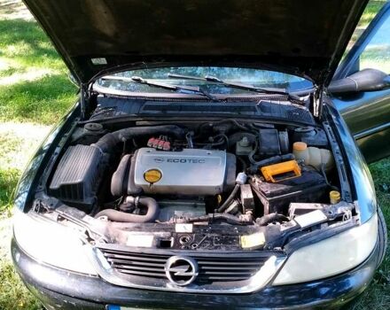 Черный Опель Вектра, объемом двигателя 1.6 л и пробегом 300 тыс. км за 1650 $, фото 1 на Automoto.ua