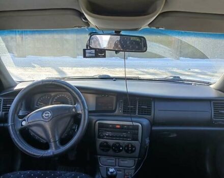 Черный Опель Вектра, объемом двигателя 2 л и пробегом 365 тыс. км за 2500 $, фото 1 на Automoto.ua