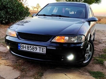 Черный Опель Вектра, объемом двигателя 2 л и пробегом 195 тыс. км за 3300 $, фото 1 на Automoto.ua