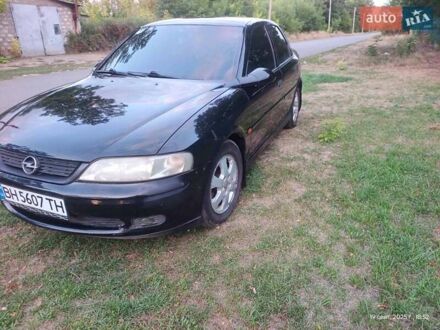 Черный Опель Вектра, объемом двигателя 1.8 л и пробегом 250 тыс. км за 2300 $, фото 1 на Automoto.ua