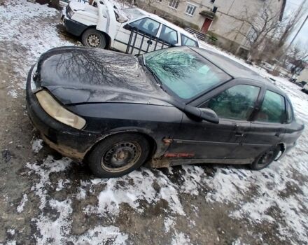 Черный Опель Вектра, объемом двигателя 2 л и пробегом 345 тыс. км за 1300 $, фото 1 на Automoto.ua