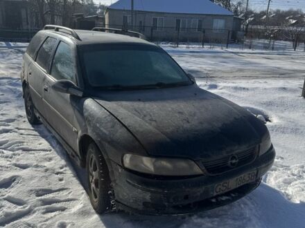Черный Опель Вектра, объемом двигателя 2 л и пробегом 350 тыс. км за 1550 $, фото 1 на Automoto.ua