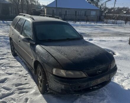 Черный Опель Вектра, объемом двигателя 2 л и пробегом 350 тыс. км за 1550 $, фото 1 на Automoto.ua