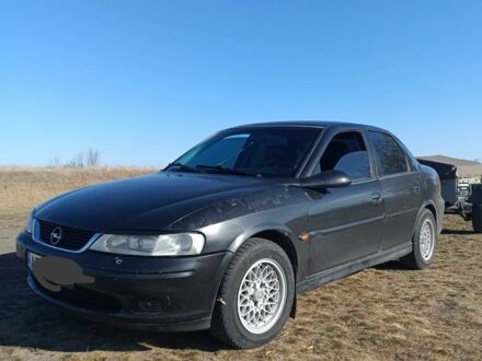 Черный Опель Вектра, объемом двигателя 2 л и пробегом 306 тыс. км за 2800 $, фото 1 на Automoto.ua