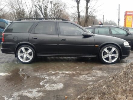 Черный Опель Вектра, объемом двигателя 2 л и пробегом 360 тыс. км за 2000 $, фото 1 на Automoto.ua