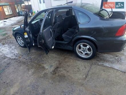 Черный Опель Вектра, объемом двигателя 1.8 л и пробегом 340 тыс. км за 1950 $, фото 1 на Automoto.ua