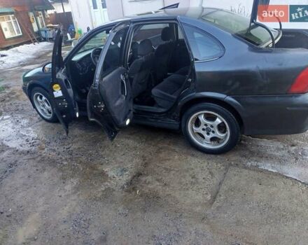 Черный Опель Вектра, объемом двигателя 1.8 л и пробегом 340 тыс. км за 1950 $, фото 1 на Automoto.ua