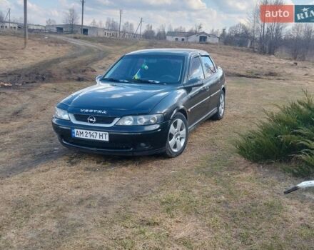 Черный Опель Вектра, объемом двигателя 2.2 л и пробегом 327 тыс. км за 3200 $, фото 1 на Automoto.ua