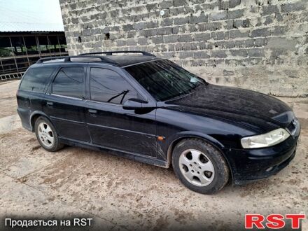 Черный Опель Вектра, объемом двигателя 2 л и пробегом 390 тыс. км за 2700 $, фото 1 на Automoto.ua