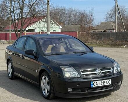 Черный Опель Вектра, объемом двигателя 2 л и пробегом 270 тыс. км за 3900 $, фото 1 на Automoto.ua