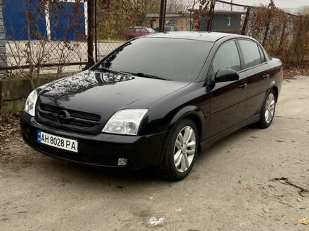 Черный Опель Вектра, объемом двигателя 2.2 л и пробегом 240 тыс. км за 3600 $, фото 1 на Automoto.ua