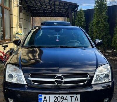 Черный Опель Вектра, объемом двигателя 2.2 л и пробегом 274 тыс. км за 5000 $, фото 1 на Automoto.ua