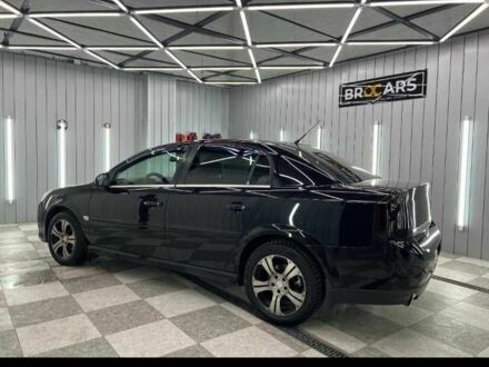 Черный Опель Вектра, объемом двигателя 2.2 л и пробегом 284 тыс. км за 6000 $, фото 1 на Automoto.ua