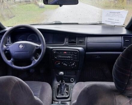 Фиолетовый Опель Вектра, объемом двигателя 2 л и пробегом 250 тыс. км за 1350 $, фото 6 на Automoto.ua