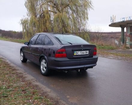 Фиолетовый Опель Вектра, объемом двигателя 2 л и пробегом 250 тыс. км за 1350 $, фото 4 на Automoto.ua