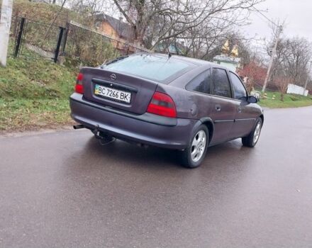 Фиолетовый Опель Вектра, объемом двигателя 2 л и пробегом 250 тыс. км за 1350 $, фото 2 на Automoto.ua