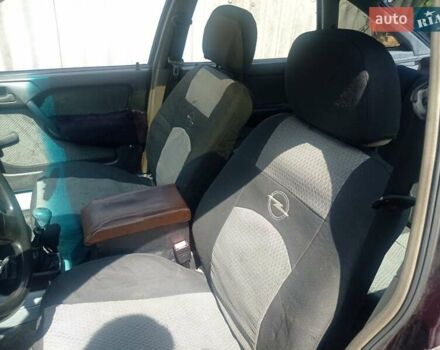 Фиолетовый Опель Вектра, объемом двигателя 2 л и пробегом 244 тыс. км за 1500 $, фото 2 на Automoto.ua