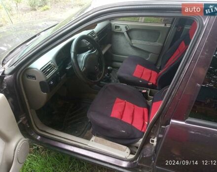 Фиолетовый Опель Вектра, объемом двигателя 2 л и пробегом 305 тыс. км за 900 $, фото 2 на Automoto.ua