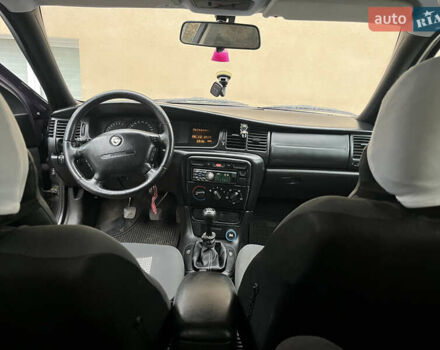 Фіолетовий Опель Вектра, об'ємом двигуна 1.8 л та пробігом 307 тис. км за 1900 $, фото 9 на Automoto.ua