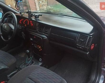 Фиолетовый Опель Вектра, объемом двигателя 1.6 л и пробегом 361 тыс. км за 2150 $, фото 22 на Automoto.ua