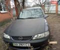 Фиолетовый Опель Вектра, объемом двигателя 2 л и пробегом 300 тыс. км за 1500 $, фото 1 на Automoto.ua