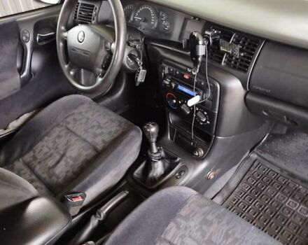 Фиолетовый Опель Вектра, объемом двигателя 2 л и пробегом 226 тыс. км за 2850 $, фото 7 на Automoto.ua