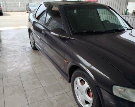 Фиолетовый Опель Вектра, объемом двигателя 2 л и пробегом 226 тыс. км за 2850 $, фото 10 на Automoto.ua