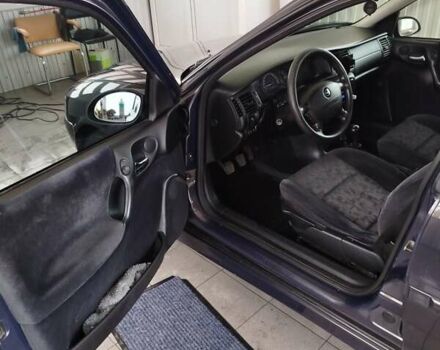 Фиолетовый Опель Вектра, объемом двигателя 2 л и пробегом 226 тыс. км за 2850 $, фото 15 на Automoto.ua