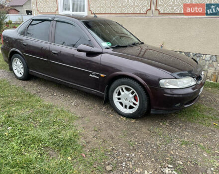 Фиолетовый Опель Вектра, объемом двигателя 1.6 л и пробегом 65 тыс. км за 3200 $, фото 11 на Automoto.ua