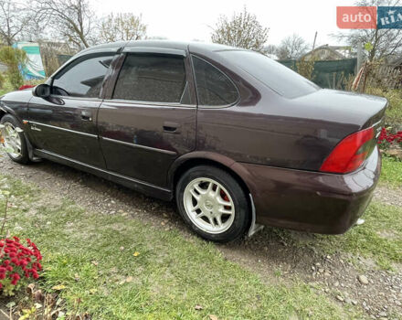 Фиолетовый Опель Вектра, объемом двигателя 1.6 л и пробегом 65 тыс. км за 2800 $, фото 14 на Automoto.ua