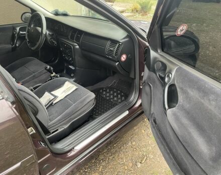 Фиолетовый Опель Вектра, объемом двигателя 1.6 л и пробегом 65 тыс. км за 2700 $, фото 13 на Automoto.ua