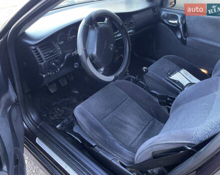 Фиолетовый Опель Вектра, объемом двигателя 1.6 л и пробегом 145 тыс. км за 3750 $, фото 16 на Automoto.ua