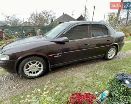 Фиолетовый Опель Вектра, объемом двигателя 1.6 л и пробегом 65 тыс. км за 2800 $, фото 13 на Automoto.ua