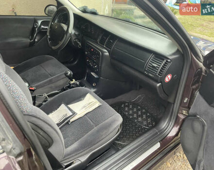 Фиолетовый Опель Вектра, объемом двигателя 1.6 л и пробегом 65 тыс. км за 2800 $, фото 20 на Automoto.ua