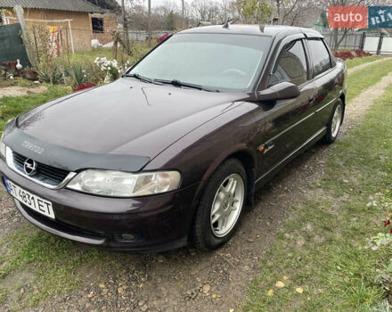 Фиолетовый Опель Вектра, объемом двигателя 1.6 л и пробегом 65 тыс. км за 2800 $, фото 19 на Automoto.ua