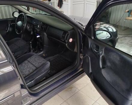 Фиолетовый Опель Вектра, объемом двигателя 2 л и пробегом 226 тыс. км за 2850 $, фото 8 на Automoto.ua