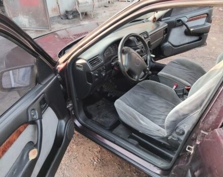 Фиолетовый Опель Вектра, объемом двигателя 2 л и пробегом 44 тыс. км за 1600 $, фото 4 на Automoto.ua