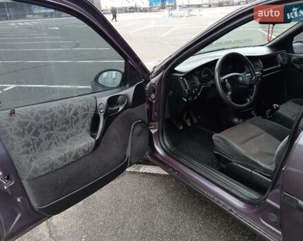 Фиолетовый Опель Вектра, объемом двигателя 2 л и пробегом 453 тыс. км за 2400 $, фото 23 на Automoto.ua