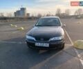 Фиолетовый Опель Вектра, объемом двигателя 1.8 л и пробегом 311 тыс. км за 3000 $, фото 1 на Automoto.ua