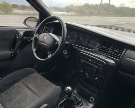 Фіолетовий Опель Вектра, об'ємом двигуна 1.6 л та пробігом 380 тис. км за 1500 $, фото 9 на Automoto.ua