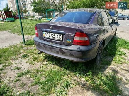 Фиолетовый Опель Вектра, объемом двигателя 1.8 л и пробегом 400 тыс. км за 700 $, фото 1 на Automoto.ua
