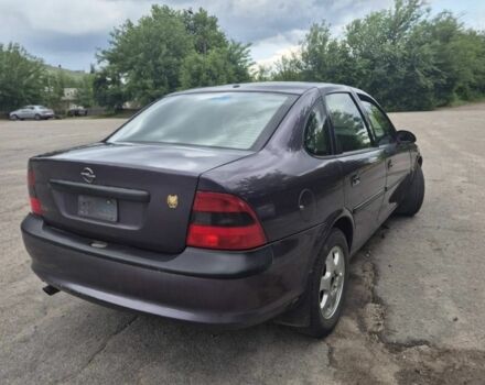 Фиолетовый Опель Вектра, объемом двигателя 2 л и пробегом 400 тыс. км за 2596 $, фото 1 на Automoto.ua