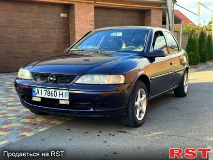 Фиолетовый Опель Вектра, объемом двигателя 1.6 л и пробегом 300 тыс. км за 1500 $, фото 1 на Automoto.ua