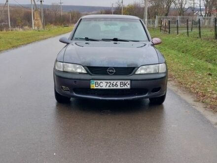 Фиолетовый Опель Вектра, объемом двигателя 2 л и пробегом 250 тыс. км за 1350 $, фото 1 на Automoto.ua