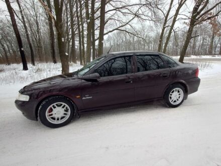 Фиолетовый Опель Вектра, объемом двигателя 1.6 л и пробегом 150 тыс. км за 3800 $, фото 1 на Automoto.ua