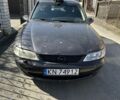 Коричневый Опель Вектра, объемом двигателя 2 л и пробегом 256 тыс. км за 600 $, фото 1 на Automoto.ua