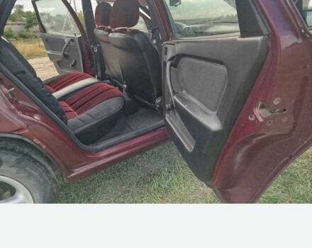 Червоний Опель Вектра, об'ємом двигуна 2 л та пробігом 323 тис. км за 1707 $, фото 5 на Automoto.ua