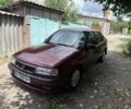 Красный Опель Вектра, объемом двигателя 1.8 л и пробегом 246 тыс. км за 2610 $, фото 1 на Automoto.ua
